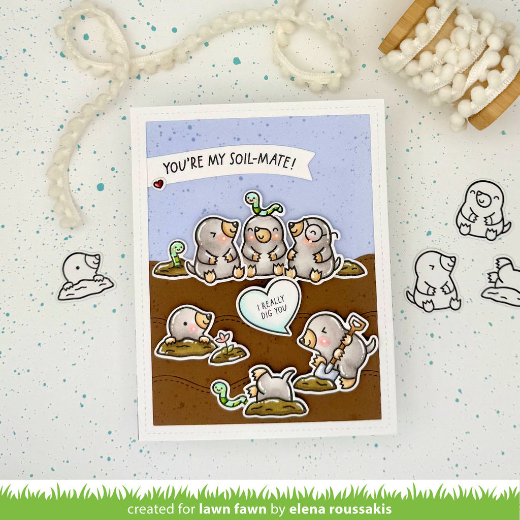 Card with cartoon moles and text 'You're my soil-mate!' on a speckled background.