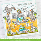 Cartoon-style card with ducks and books on a wooden background