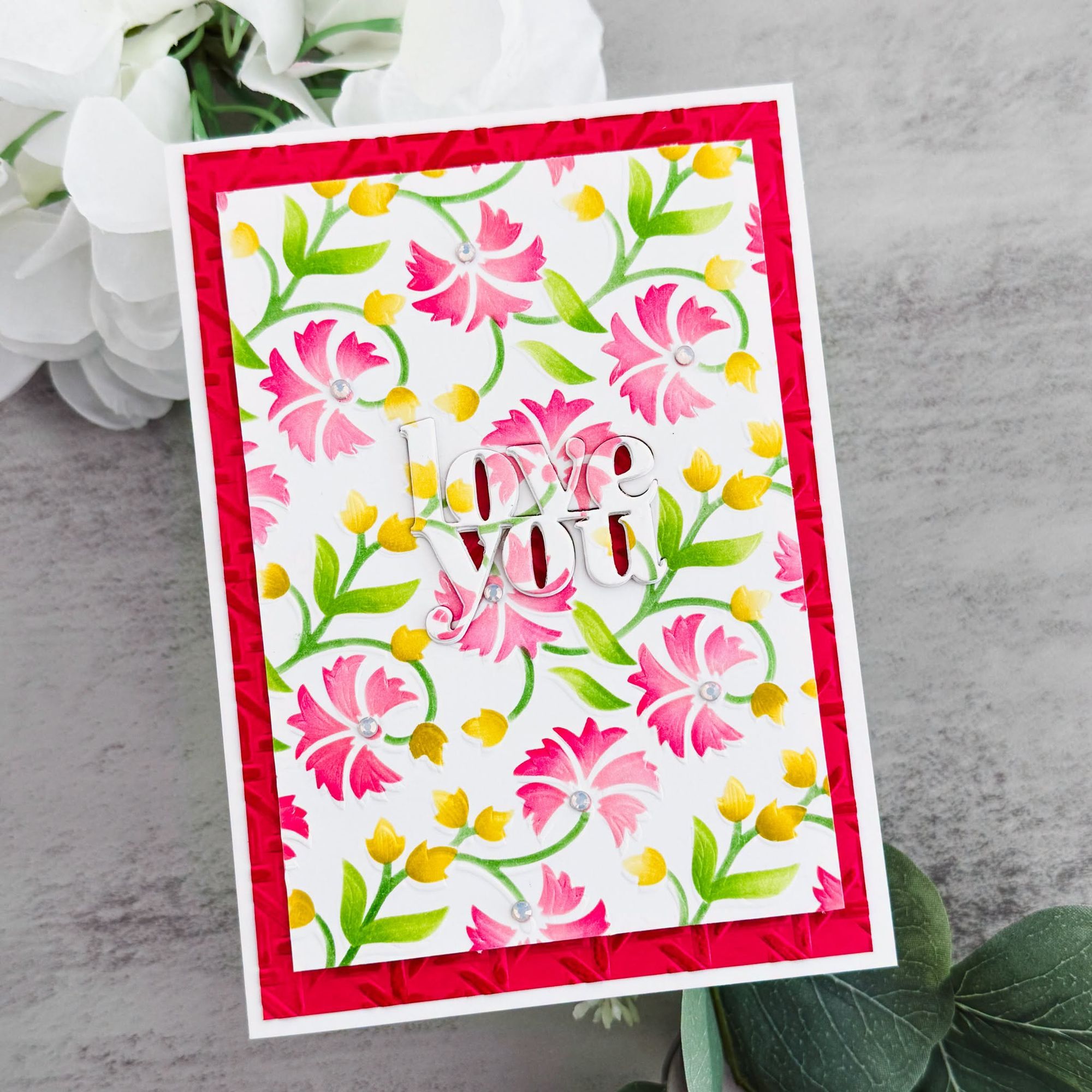 Spellbinders Rattan Cane 3D Embossing Folder e3d-178 pink flowers red background love you card
